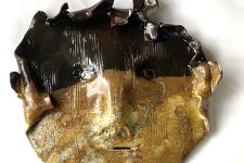 ceramic mask with tenmoku oil spot glaze