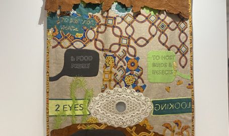 Textile banner listing the Rights of a Tree with an abstracted depiction of a tree and text bubbles